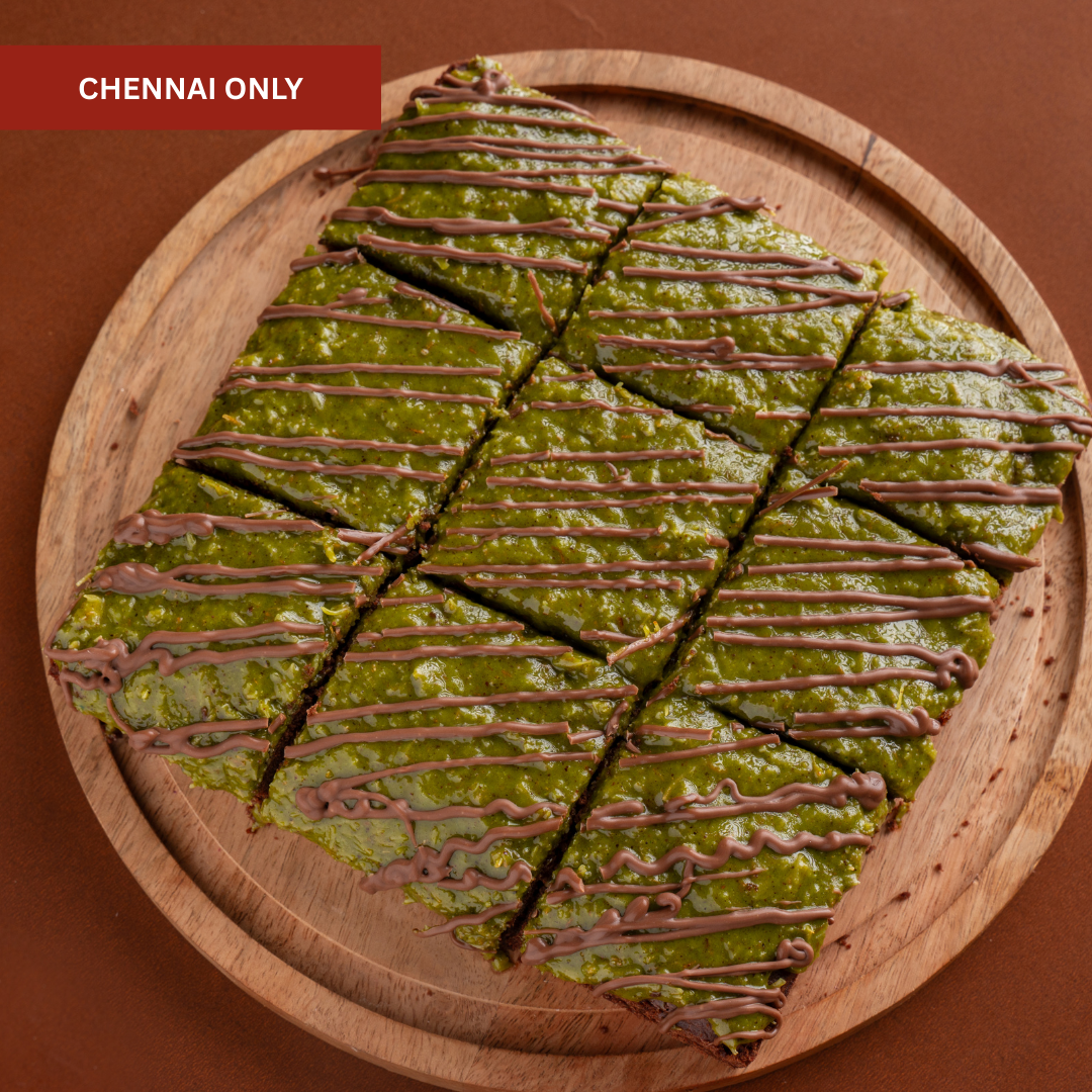 "Close-up of fudgy brownie with crispy kunafa topping