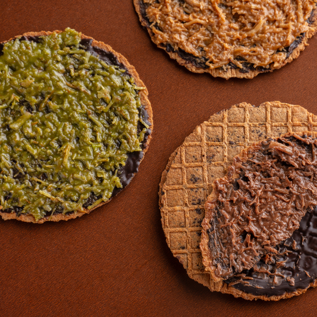 Elegant chocolate-coated waffle crisps on display