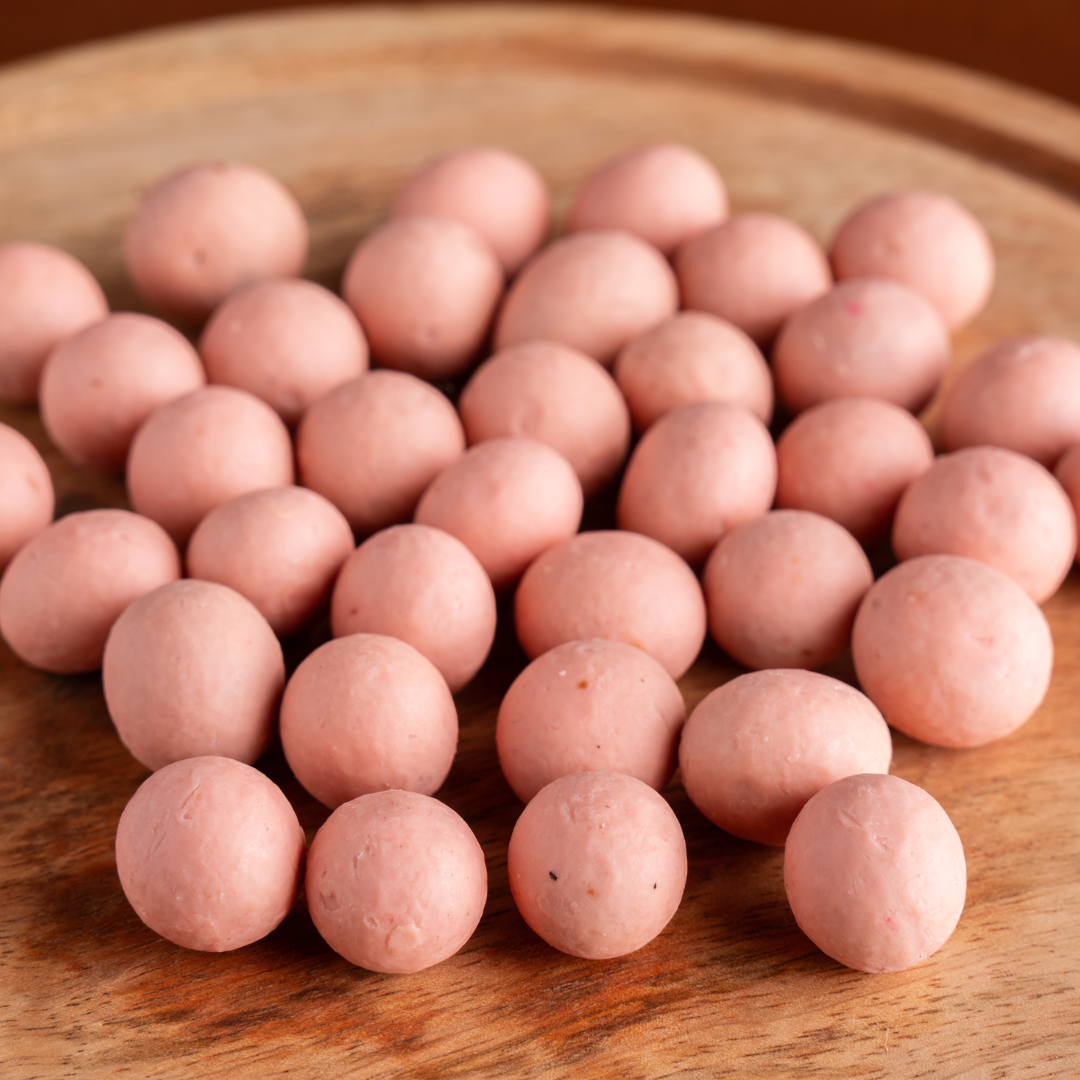 Cranberry cheesecake flavoured chocolate dragees