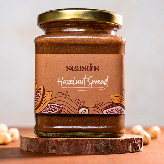Smooth and creamy hazelnut spread swirled in a jar, ready to enjoy.